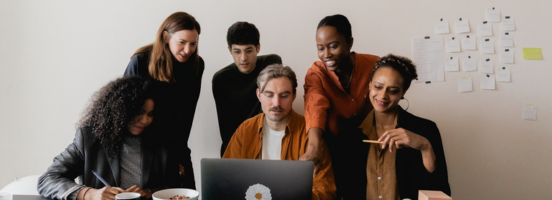 A diverse group of individuals collaborates around a laptop, engaged in a discussion about msp direct sourcing strategies. A diverse group of individuals collaborates around a laptop, engaged in a discussion about msp direct sourcing strategies.