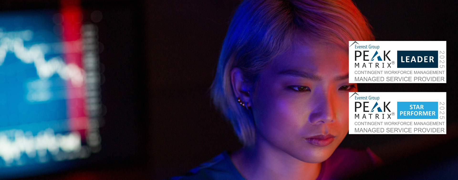 Female tech professional looking at a computer screen Female tech professional looking at a computer screen